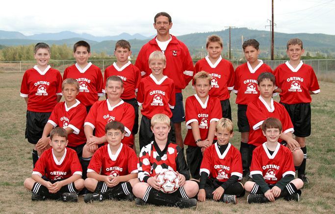 Youth soccer team in Code Four Pioneer soccer jerseys.